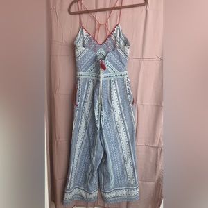 Anthropology Jumpsuite. Medium. Patterns with blue green and orange straps